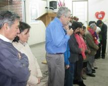 praying for families in Peru