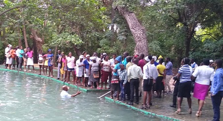 crowds watching baptisms
